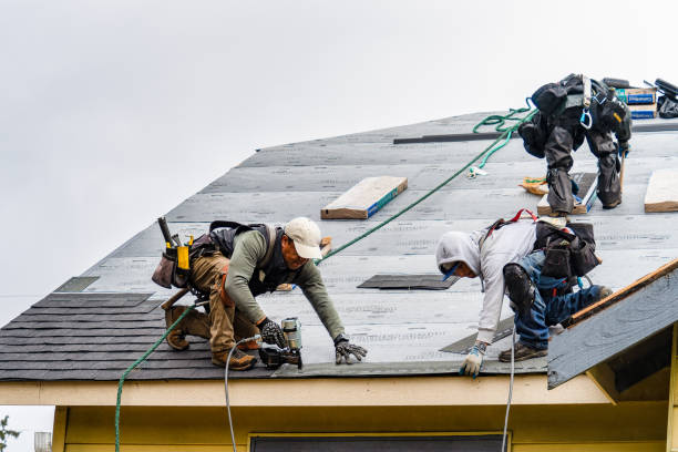 Professional Roofing technician working in Brunswick, NC
